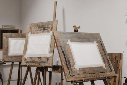 Clear sheets of paper on easels in drawing class