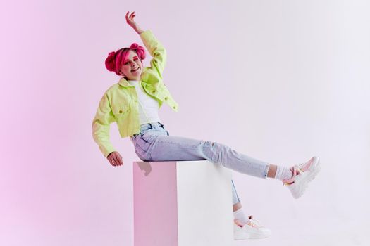 fashionable woman with pink hair creative studio model. High quality photo