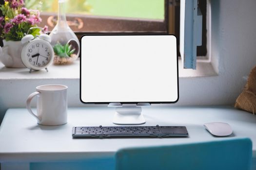 tablet for work on wood desk, a blank tablet screen can add text or other media