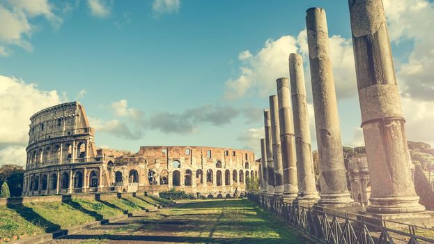 Ancient columns of the Roman temple near the Coliseum in Rome