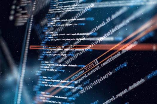Notebook closeup photo. CSS, JavaScript and HTML usage. Monitor closeup of function source code.