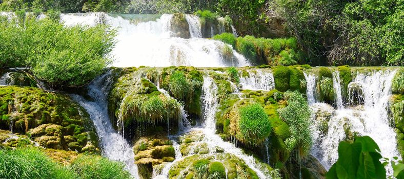 Mountainous beautiful waterfalls formed by the melting of glaciers due to global warming. Beautiful Waterfalls at Krka National Park in Croatia.