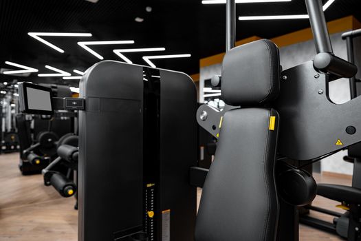 Modern gym interior with new fitness equipment, no people