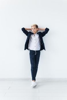 Teenage boy portrait on a white background.