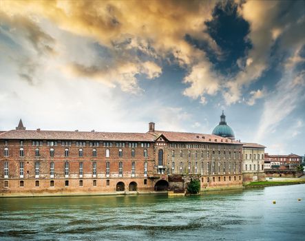 magestic view from river Sona on a building at sunset in Lyon, France