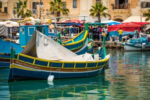 colorful fishing boat in the bay near Marsaxlokk in Malta