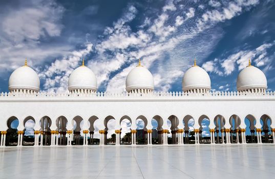 five domes of Sheikh Zayed Mosque against sky in Abu Dhabi