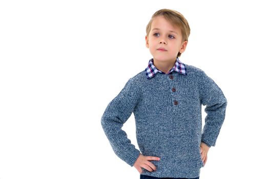 Smiling little boy, studio portrait on white background. The concept of a happy childhood, well-being in the family. Close-up. Isolated.