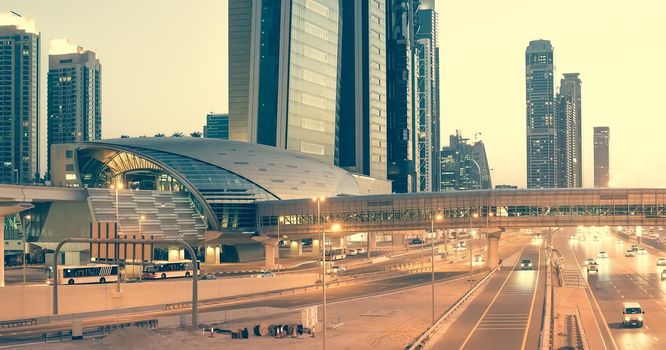 Skyscraper roads and bridge at the Sheikh Zayed Road in Dubai in the evening, United Arab Emirates