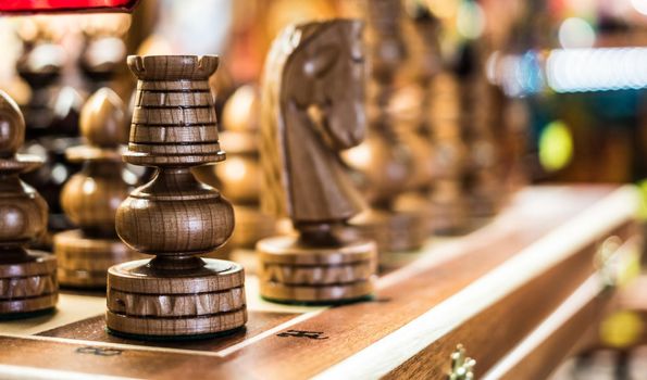 macro of wooden chess on board in a shop