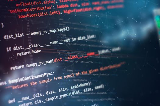 Notebook closeup photo. CSS, JavaScript and HTML usage. Monitor closeup of function source code.
