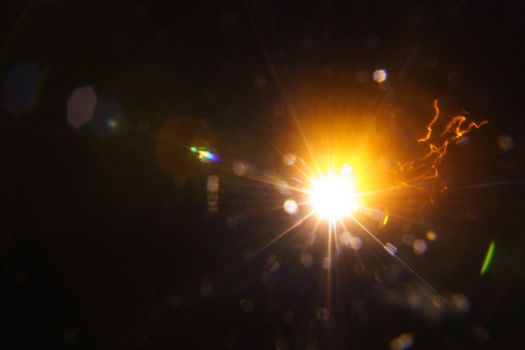 Abstract imitation sun starlight distant galaxy on a black background. -image