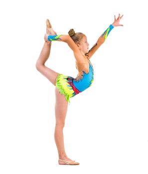 tittle gymnast doing stretching exercise isolated on white background