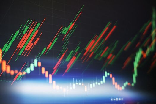 New modern computer and business strategy as concept. Financial diagram with candlestick chart used in market analysis for variation report of share price