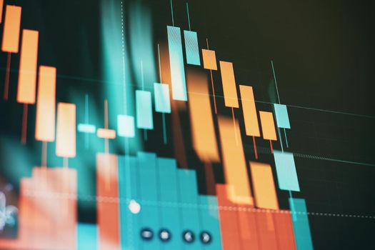 Technical price graph and indicator, red and green candlestick chart on blue theme screen, market volatility, up and down trend. Stock trading, crypto currency background .