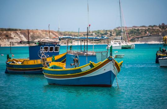 fishing boats near fishing village of Marsaxlokk (Marsascala) in Malta