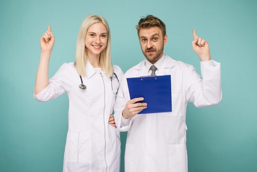 Friendly Male and Female Doctors. Happy medical team of doctors. - Image