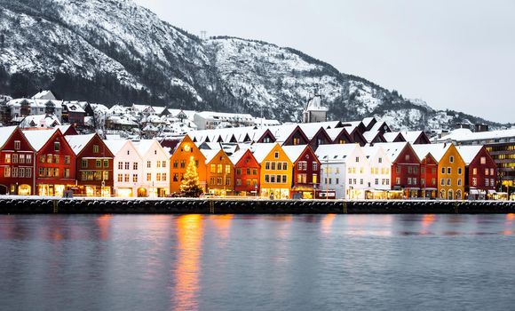 Bryggen street with wooden colored houses in Bergen at Christmas, Norway