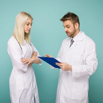 Friendly Male and Female Doctors. Happy medical team of doctors. - Image
