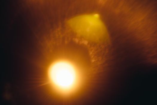 Abstract Natural Sun flare on the black.