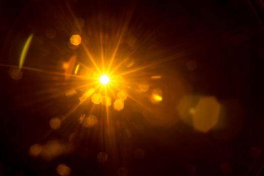 Abstract Natural Sun flare on the black.