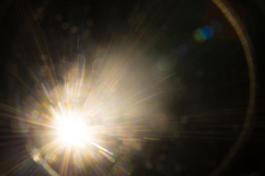 Abstract Natural Sun flare on the black.