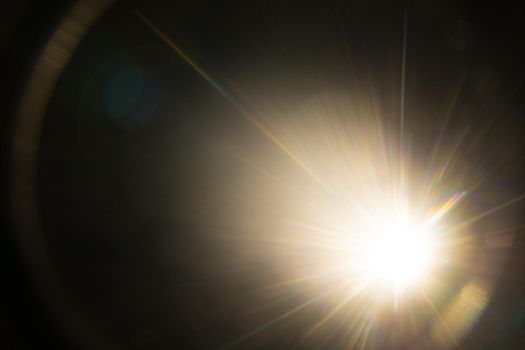 Abstract Natural Sun flare on the black.