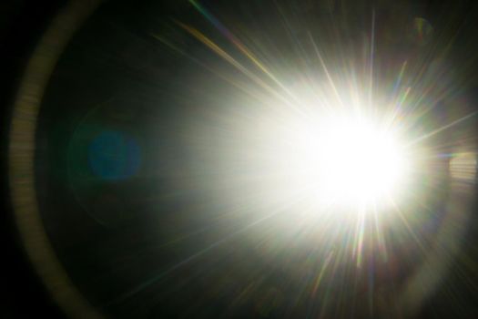 Abstract Natural Sun flare on the black.