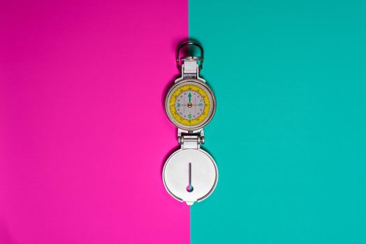 compass on colored background studio