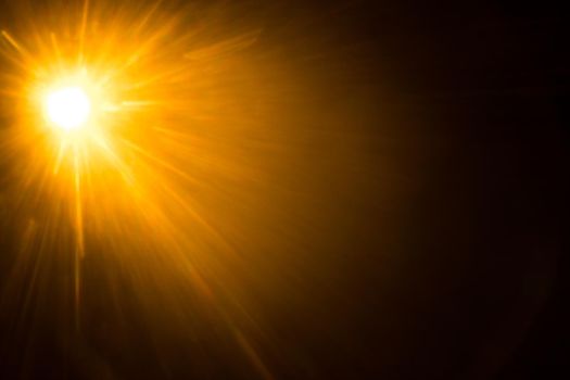 Abstract Natural Sun flare on the black.