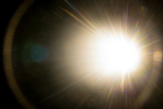 Abstract Natural Sun flare on the black.