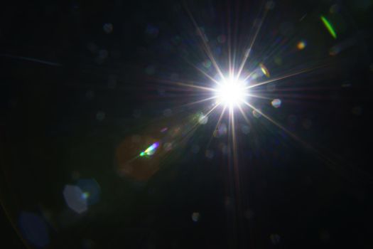 Abstract imitation sun starlight distant galaxy on a black background. -image