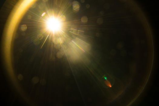 Abstract Natural Sun flare on the black.