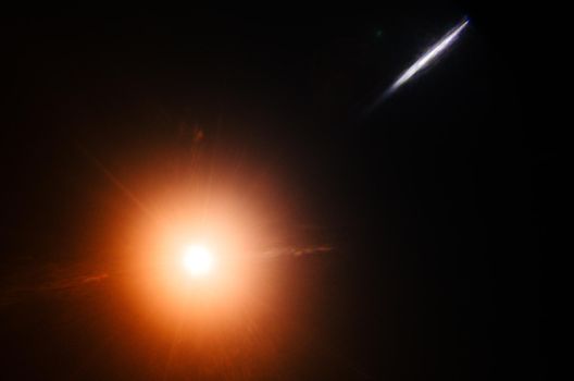 Abstract Natural Sun flare or Far star on the black background - image