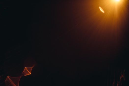 Abstract Natural Sun flare on the black.