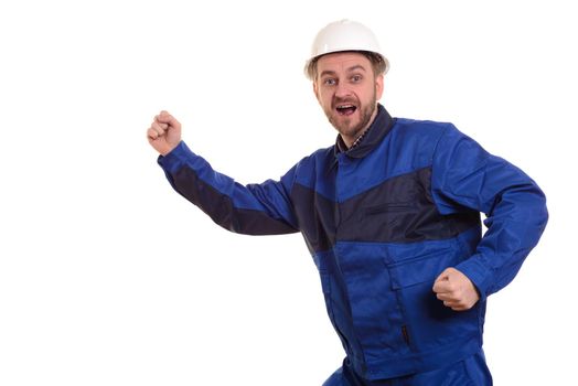 Beard man builder in hard hat and overalls runs for construction isolated on the white background.