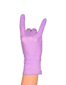 The Rock N' Roll Hand Sign. Hand in a purple latex glove isolated on white. Woman's hand gesture or sign isolated on white.