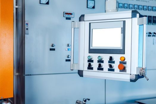 Close up photo of production in the industry with various manufacturing machines