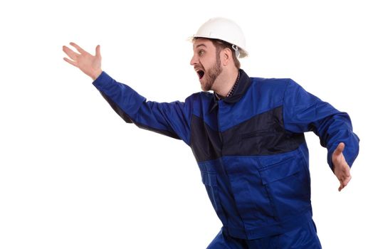 shocked civil engineer in a protective white helmet and blue uniform over white background.