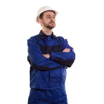 Construction worker Engineer-builder in a protective white helmet and blue uniform, isolated on white.