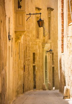 traditional narrow silent street in Maltese Mdina