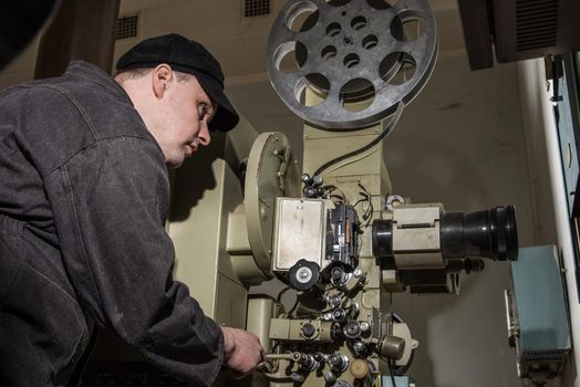 projectionist at work in the room projectionist