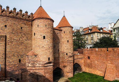 view on Barbakan walls and towers in Warsaw in Poland