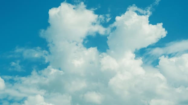 Blue sky background with clouds - image toned