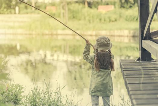 little fisher girl and a river background