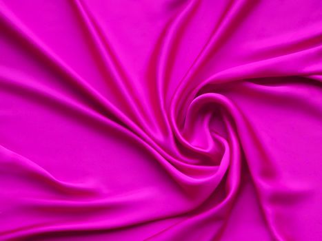 Pink smooth elegant luxurious satin background texture close up - abstracted wallpaper or postcard or background