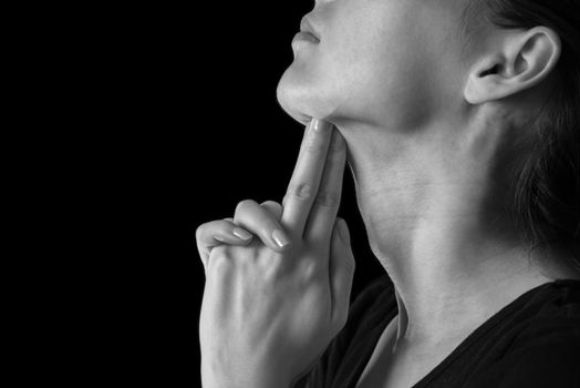 Unrecognizable woman makes gesture shot gun