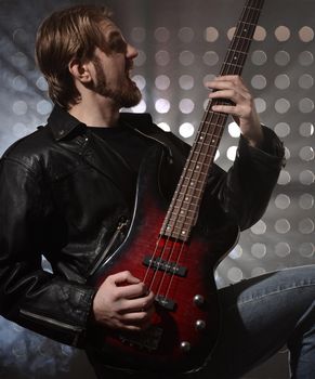 a bassist plays at a live concert