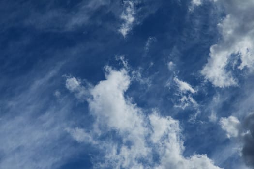 Beautiful fluffy white clouds against the blue sky - Image