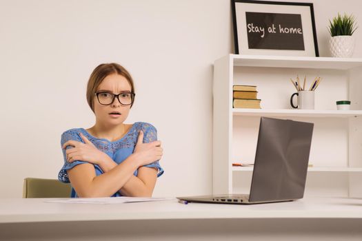 A young girl freezes in the office where the heating was cut off due to an accident on the heating main - image